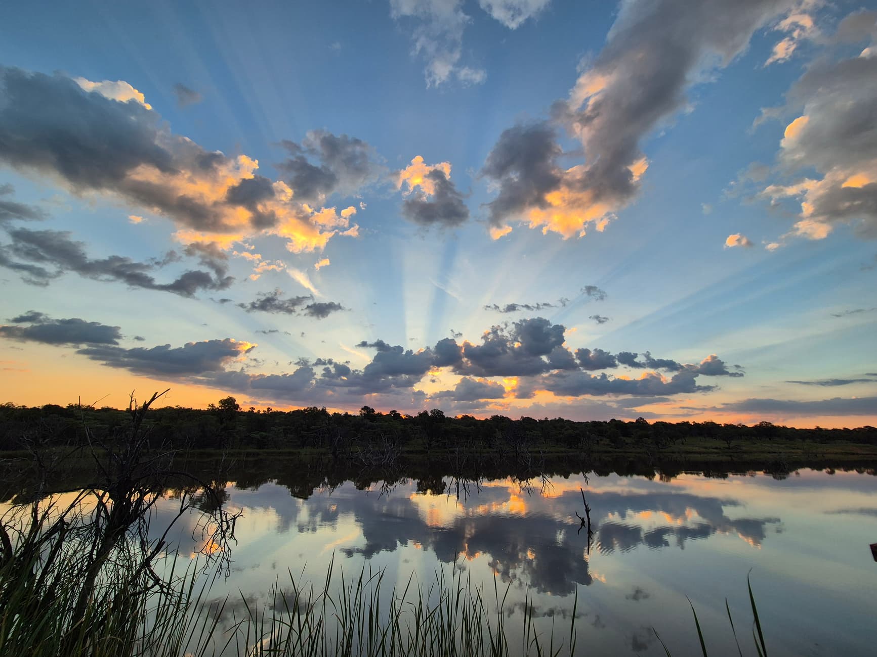 Reflections Camp chalets overlooking the dam